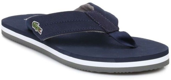 blue lacoste flip flops