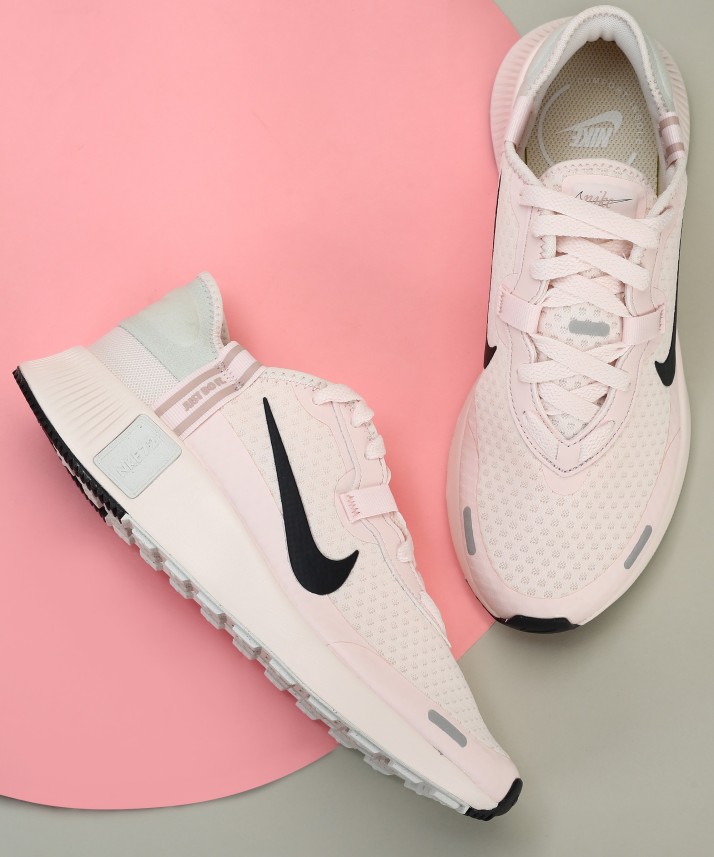 light pink nike womens running shoes