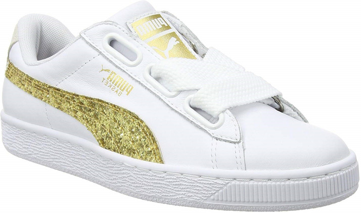 gold glitter pumas