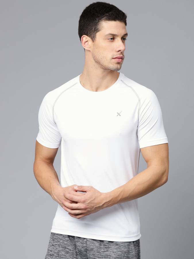 Solid Men Round Neck White T-Shirt Price in India