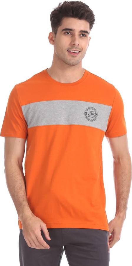 Solid Men Round Neck Orange T-Shirt Price in India