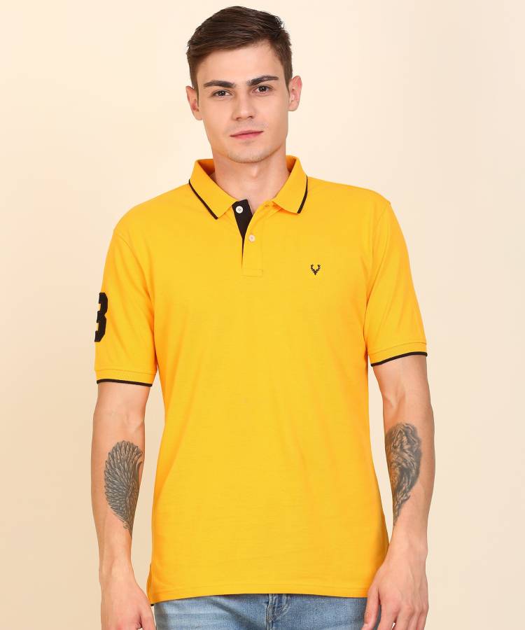 Solid Men Polo Neck Yellow T-Shirt Price in India