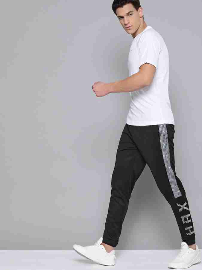 HRX by Hrithik Roshan Solid Men Black Track Pants - Buy HRX by Hrithik ...