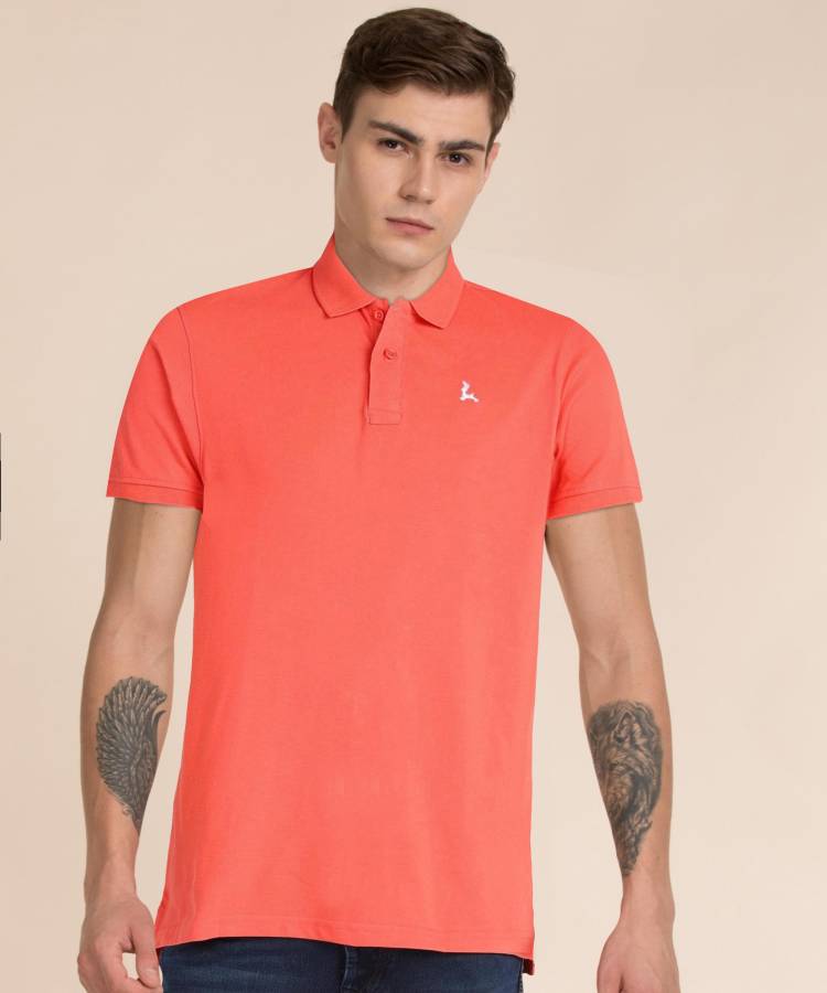 Solid Men Polo Neck Orange T-Shirt Price in India