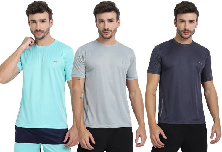 Solid Men Round Neck Light Blue, Silver, Grey T-Shirt Price in India