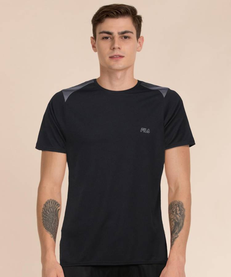 Solid Men Round Neck Blue T-Shirt Price in India