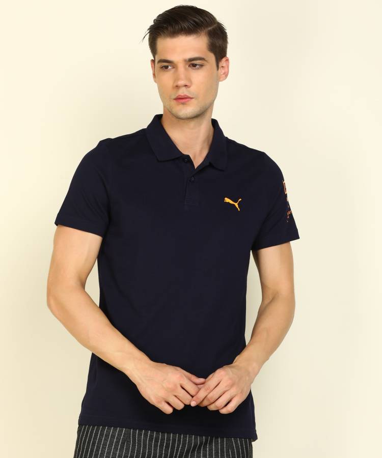 Solid Men Polo Neck Blue T-Shirt Price in India