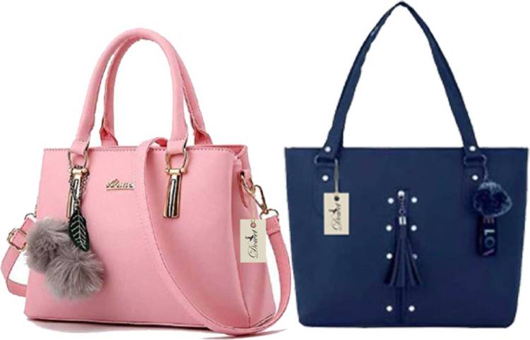 Women Pink, Blue Hand-held Bag Price in India