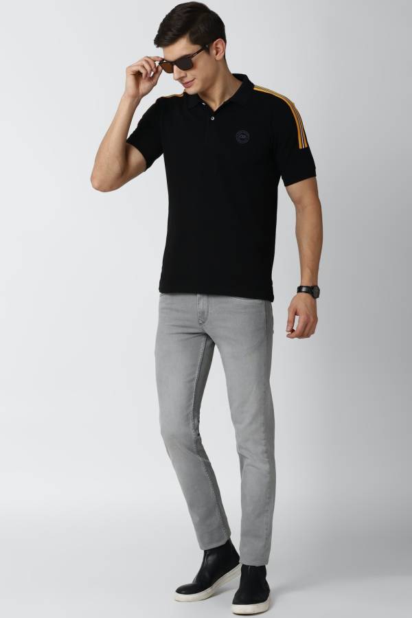 Solid Men Polo Neck Black T-Shirt Price in India