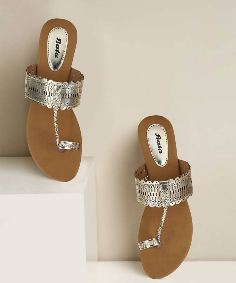 Women METALLIC TR Gold Flats Sandal Price in India