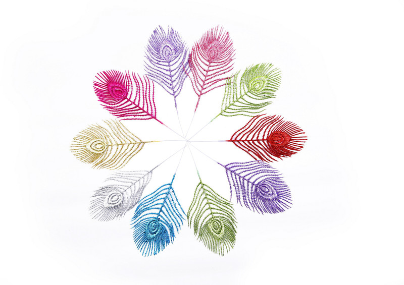 Vardhman Multicolor Glittered decorative peacock feather design leaves - 250 g Vardhman Multicolor Glittered decorative peacock feather design leaves - 250 g