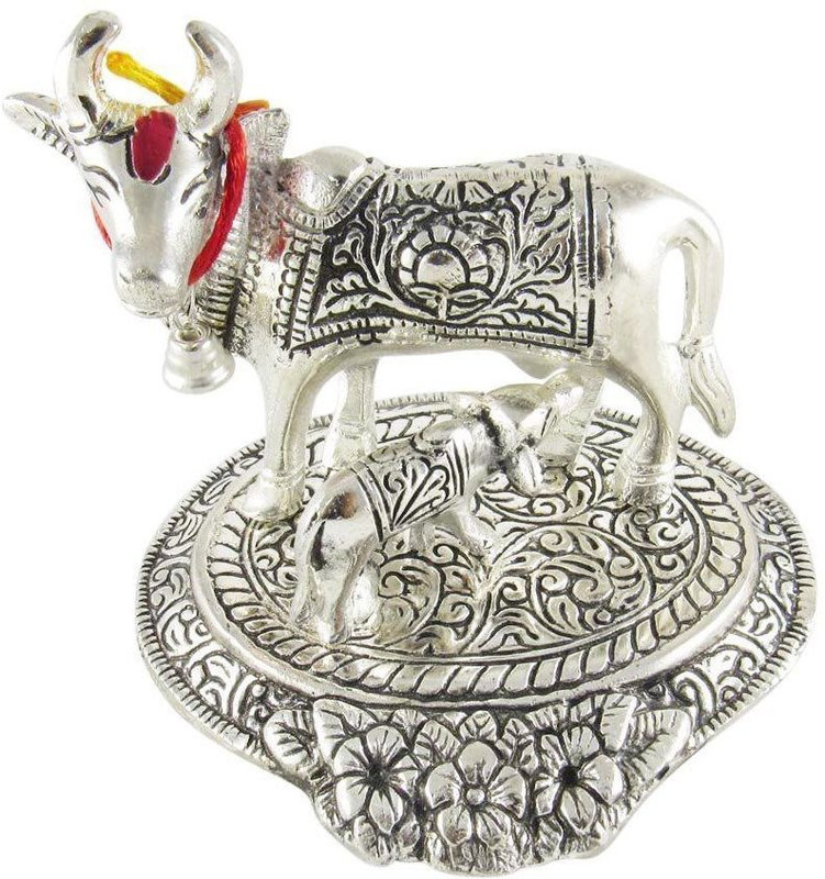 shoppingmart06 Mouse over image to zoom Have one to sell? Sell it yourself Kamdhenu Cow and Calf Showpiece - 13 cm (Aluminium, Silver, Red) Decorative Showpiece  -  10.5 cm(Brass, Silver)