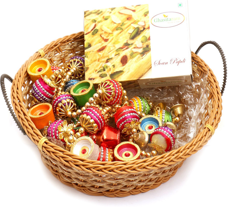 Ghasitaram Gifts Hampers-Big Cane Basket Basket with Soan Papdi, Toran and Diyas Combo(9) Ghasitaram Gifts Hampers-Big Cane Basket Basket with Soan Papdi, Toran and Diyas Combo(9)
