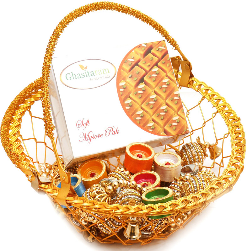 Ghasitaram Gifts Hampers-Golden Metal Basket Basket with Mysore Pak, Toran and Diyas Combo(9) Ghasitaram Gifts Hampers-Golden Metal Basket Basket with Mysore Pak, Toran and Diyas Combo(9)