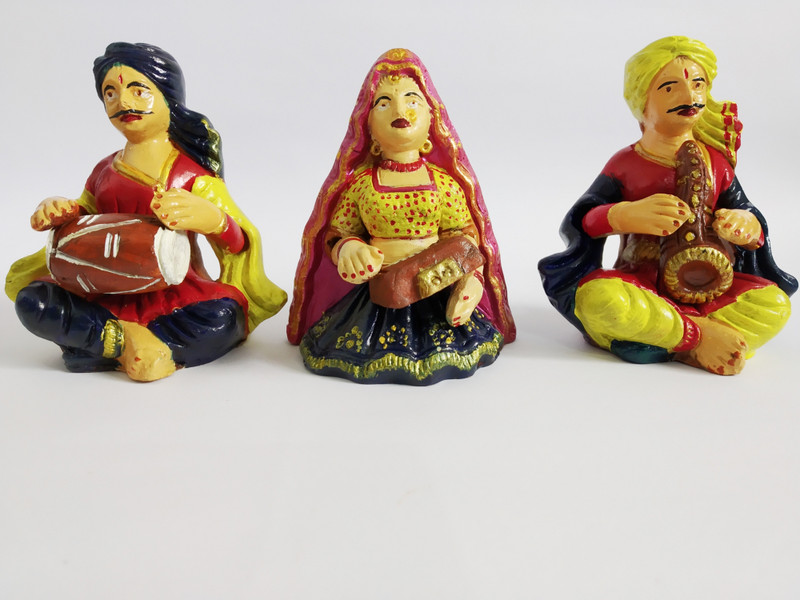 spk Handmade Terracotta Rajasthani Musical Dolls I Washable IDecorative in Living Room I Size 10 H X10 W cm I Package Contains 3 Dolls … Decorative Showpiece  -  10 cm(Terracotta)