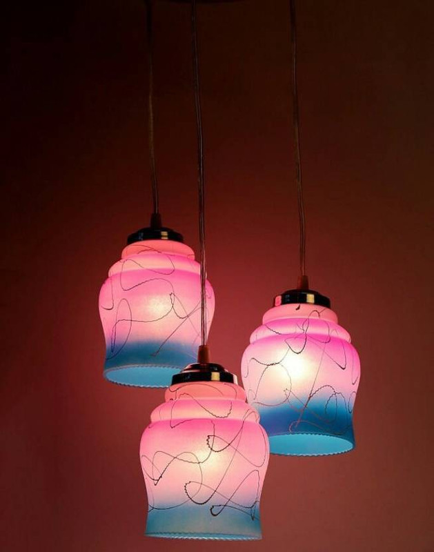 fancydesigner Give an amazing look to your room by getting this pink and blue pendant ceiling lamp, which is brought from the house of Fancy Designer. Crafted from the finest quality glass and steel material, this ceiling lamp will remain the same for many years. It is highly durable and light in we
