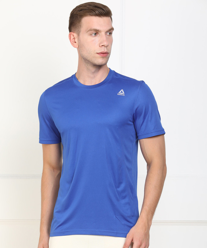 REEBOK Solid Men Round Neck Blue T-Shirt