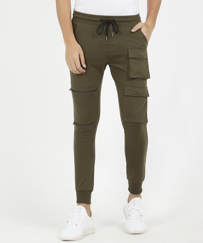 Buy SKULT by Shahid Kapoor Solid Men Green Track Pants Online at
