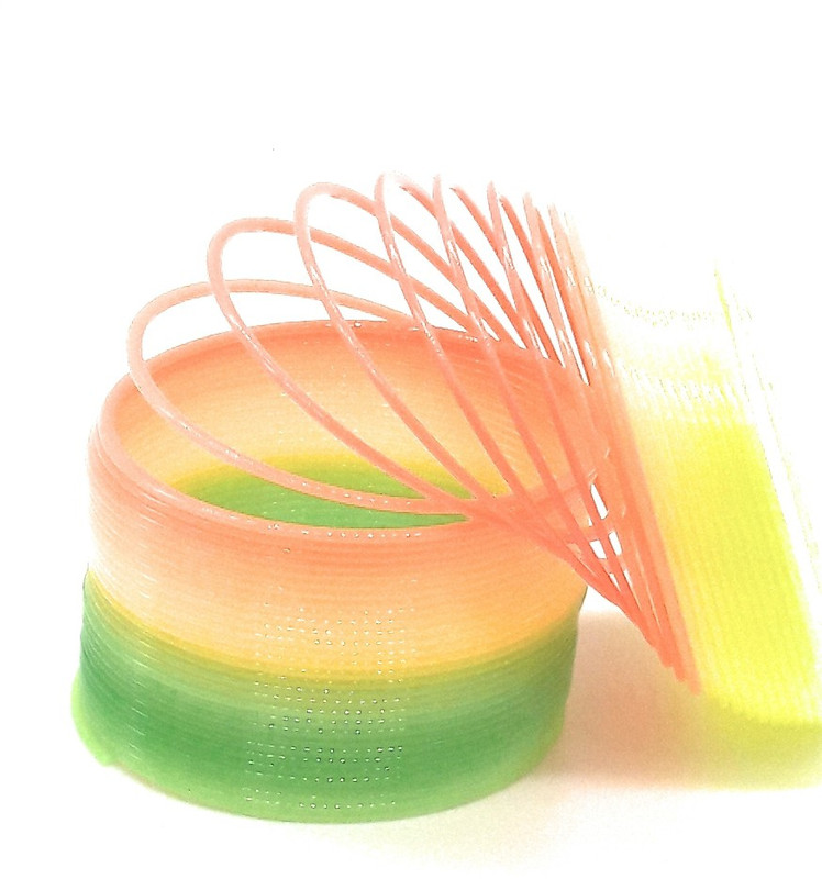 unique toy world Plastic Rainbow Slinky Plastic magic spring (Multicolor) Toy Magic Spring(Multi Color)