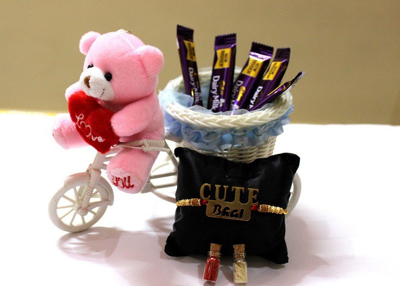 ajmera sales Designer Rakhi  Set(ONE cycle BASKET, ONE HEART TEDDY, 5 CHOCOLATE, ONE RAKHI, ONE KUMKUM BOTTEL, ONE CHAWAL BOTTEL)