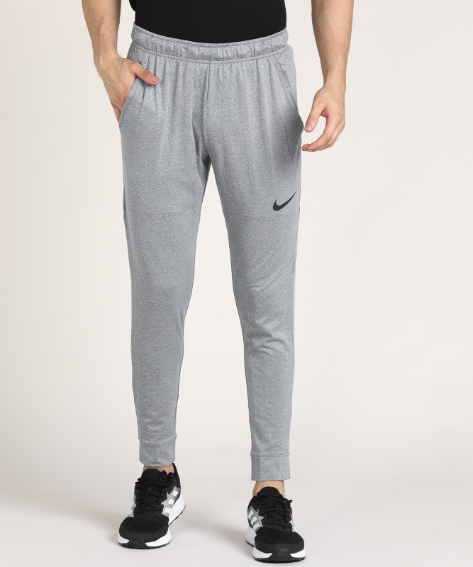Nike Solid Men Grey Track Pants- Buy 