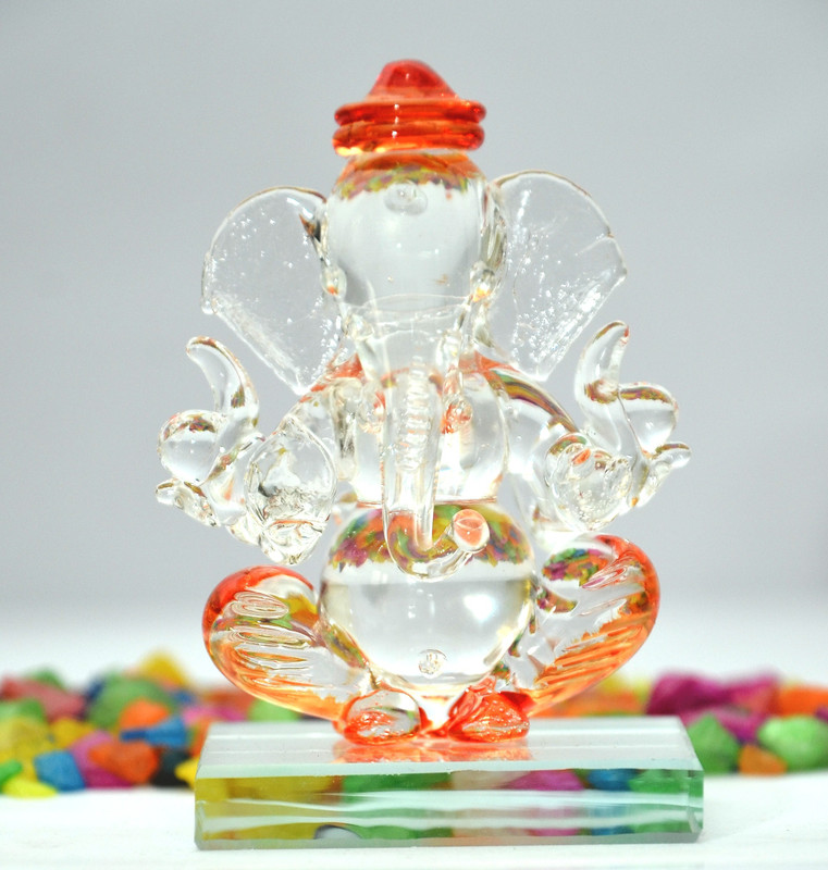craftfry Crystal Glass Ganesha Double Face Ganesha Idol for Home Decorative Showpiece  -  7.5 cm(Crystal, Orange)