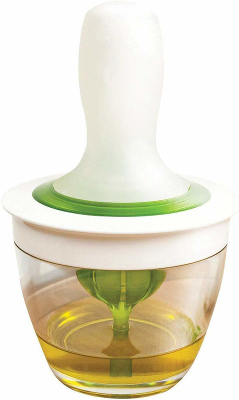 tryokart aterial: Glass + Silicone Durable silicone brush. Heat resistant silicone squeeze brush and glass jar Dispenses evenly. Unique docking system for dip and go basting Microwave safe glass jar. Dishwasher safe. BPA less. Stove-side convenience, always at hand Great for oiling pans, mopping BBQ