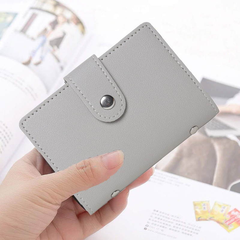 StealODeal Black Leather Debit/Credit/ATM 28 Slots Business 24 Card Holder(Set of 1, Black)