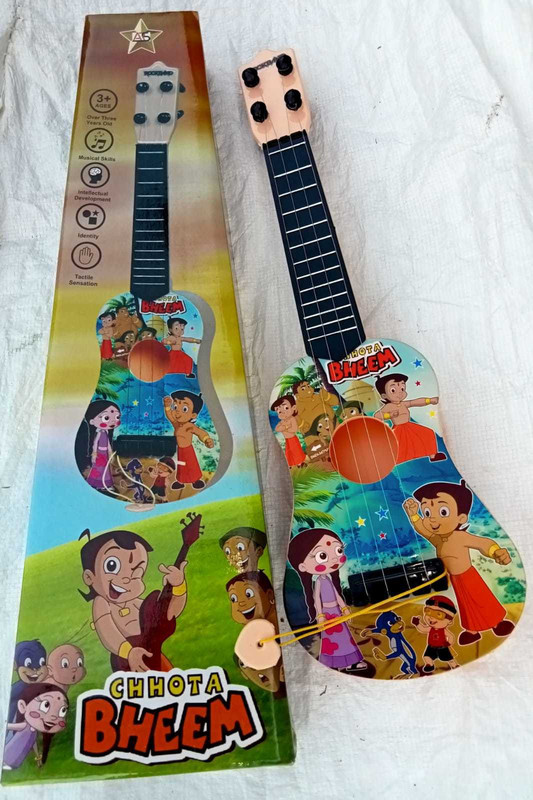 Kmc kidoz Small 4-String Guitar Toy with Adjustable Tuning for Kids(Multicolor)