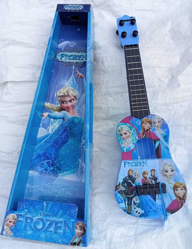 Kmc kidoz 4 String Guitar Toy ( Print Many Vary )(Multicolor)