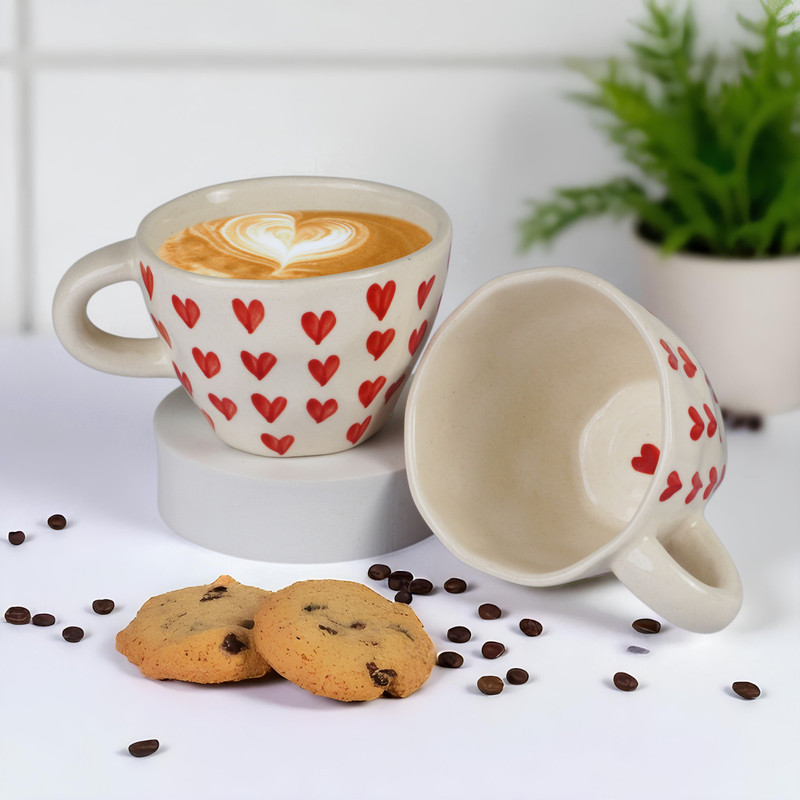 Trisha Pack of 2 Ceramic Red Heart Print Coffee and Tea cups, Ceramic Coffee Mug ( 200 ml, Pack of 2)(White, Red, Cup)