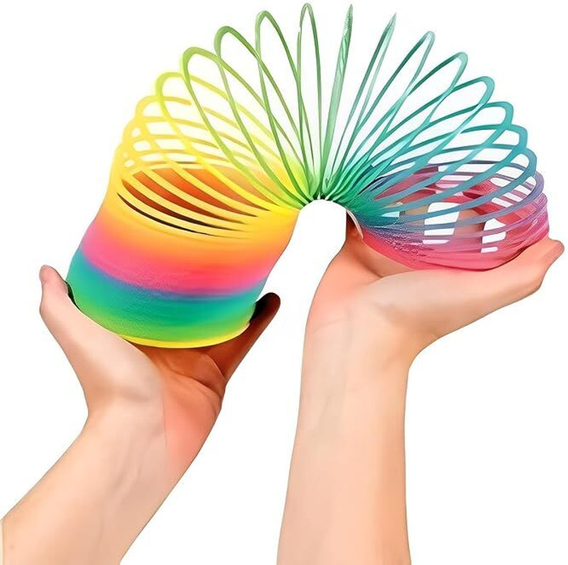 Puzzlesquad Rainbow Spring Magic Ring Gag Toy
