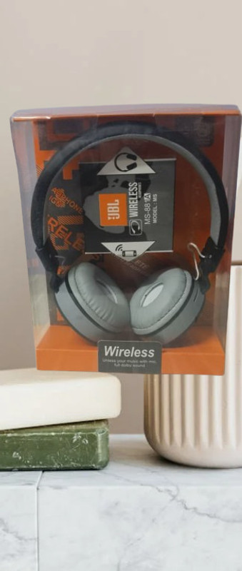 Pradeep HEADPHONE WIRELESS HIGH PERFROMANCE WITH BUILT-MIC Headphone Stand(Grey)