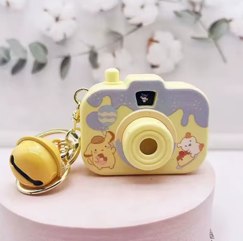 S M DECOR TRADER Cartoon Mini Projector Camera Keychain Toy – Cute Light Key Chain