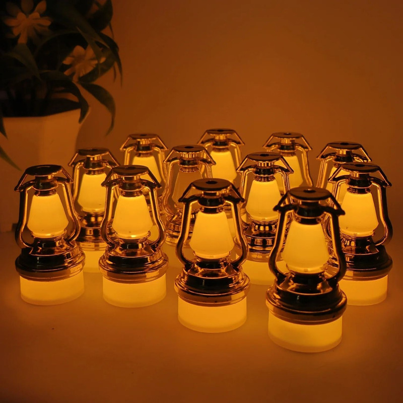DeoDap Decorative Vintage Lantern Style Flameless LED Candle Lamp for Home Decor Gold Plastic Table Lantern(9 cm X 13 cm, Pack of 12)