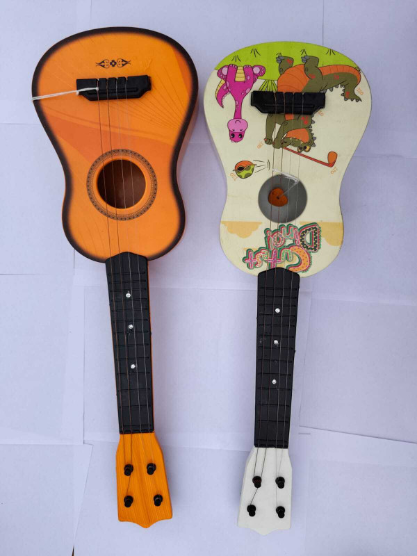 Kmc kidoz Combo Printed with wooden touch Guitar Toy 4 Strings Acoustic Music Toys(Multicolor)