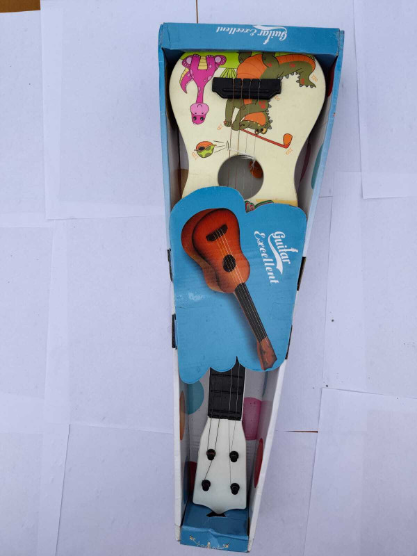Kmc kidoz 4 String Guitar Toy Musical Instrument for Beginners, Cartoon Design(Multicolor)