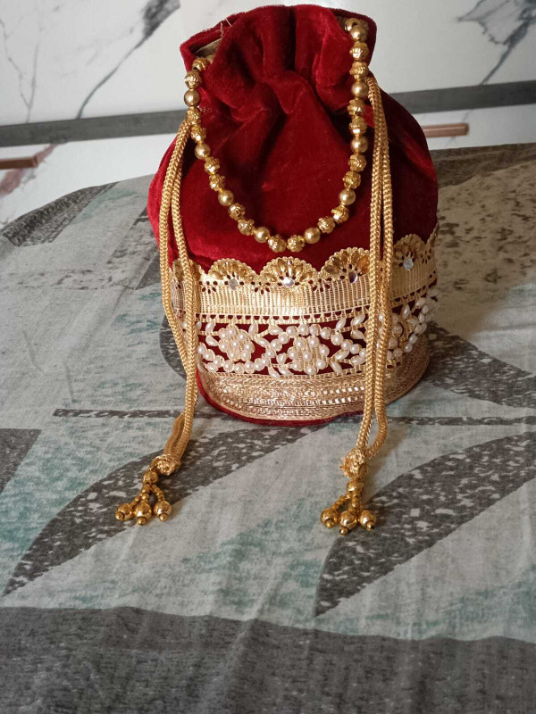style and shine Maroon Velvet Embroidered Potli Bag with Golden Pearl Handle Net Weight: Potli