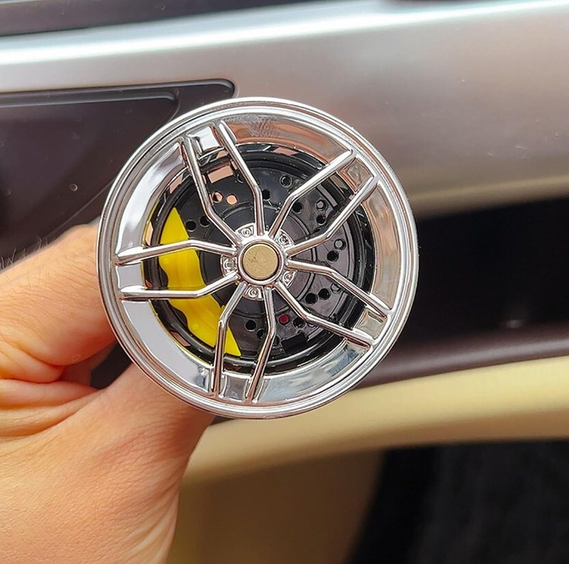 Auto MT SILVER Rotating Wheel Design Car AC Vent Clip Aromatherapy Air Freshener. Spring Leaf(Car)
