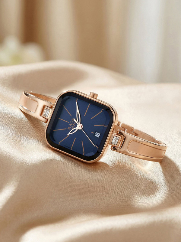 Titan NQ2607WM02 Titan Raga Viva With Date Blue Dial Rose Gold MetalStrap Analog Watch  - For Women