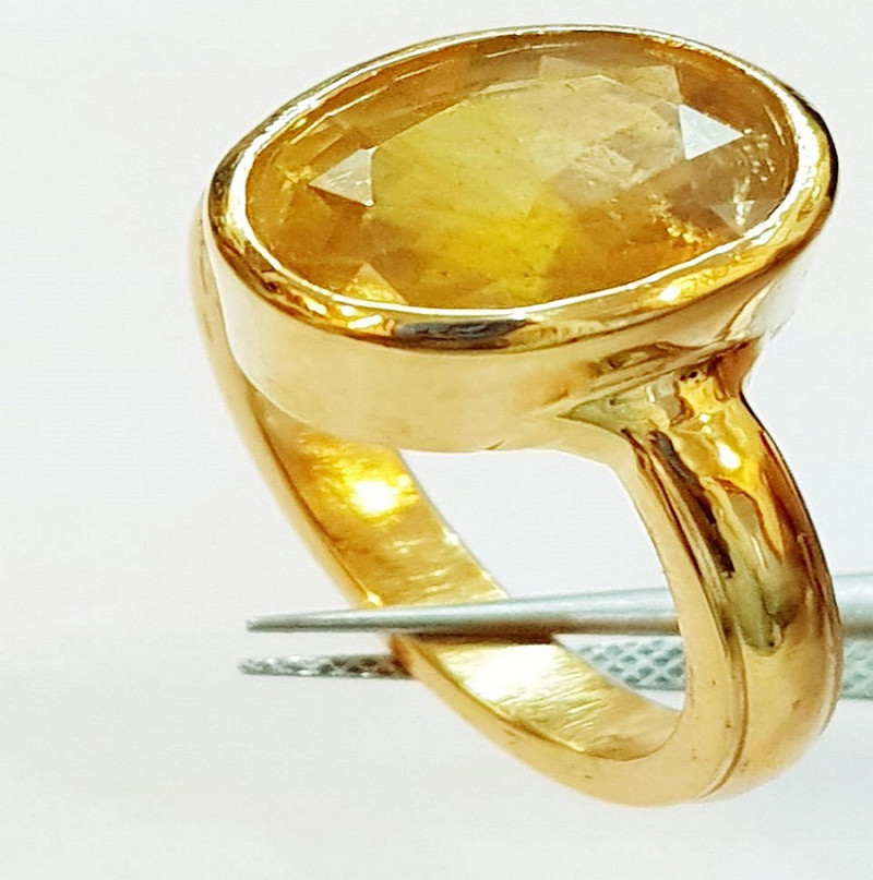 gold ring design for male with pukhraj stone