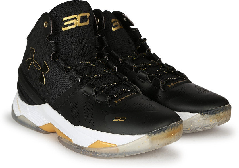 white and gold under armour basketball shoes