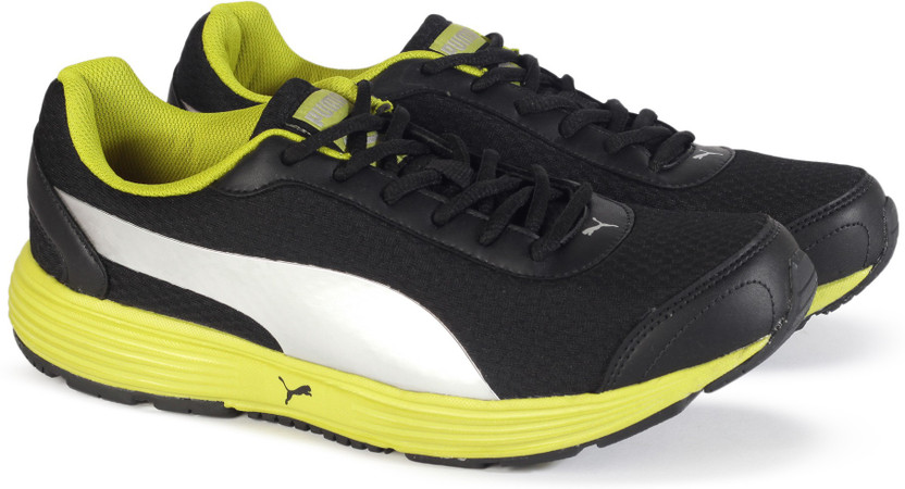 puma black and yellow shoes