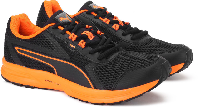 black and orange puma shoes