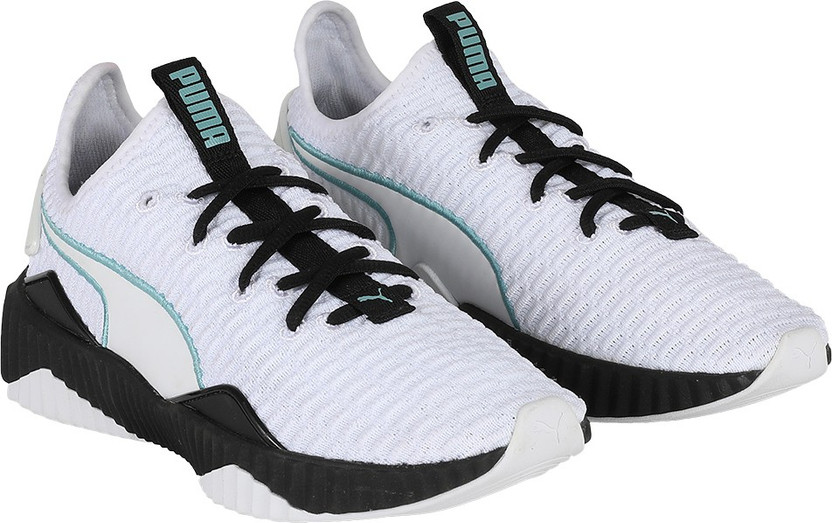 puma training defy trainers in black