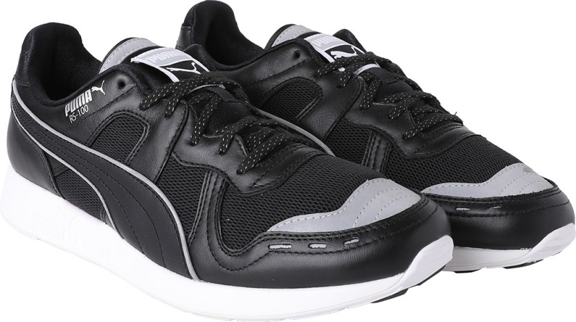 black and silver puma shoes