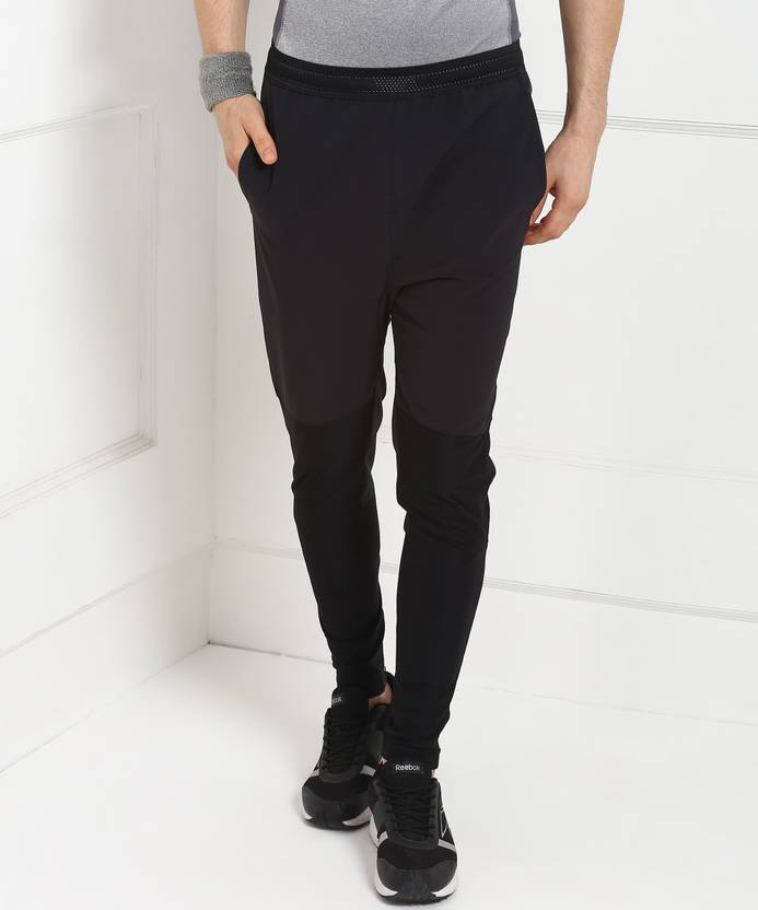 REEBOK Solid Men Black Track Pants - Buy REEBOK Solid Men Black Track Pants Online at Best Prices in India | Flipkart.com