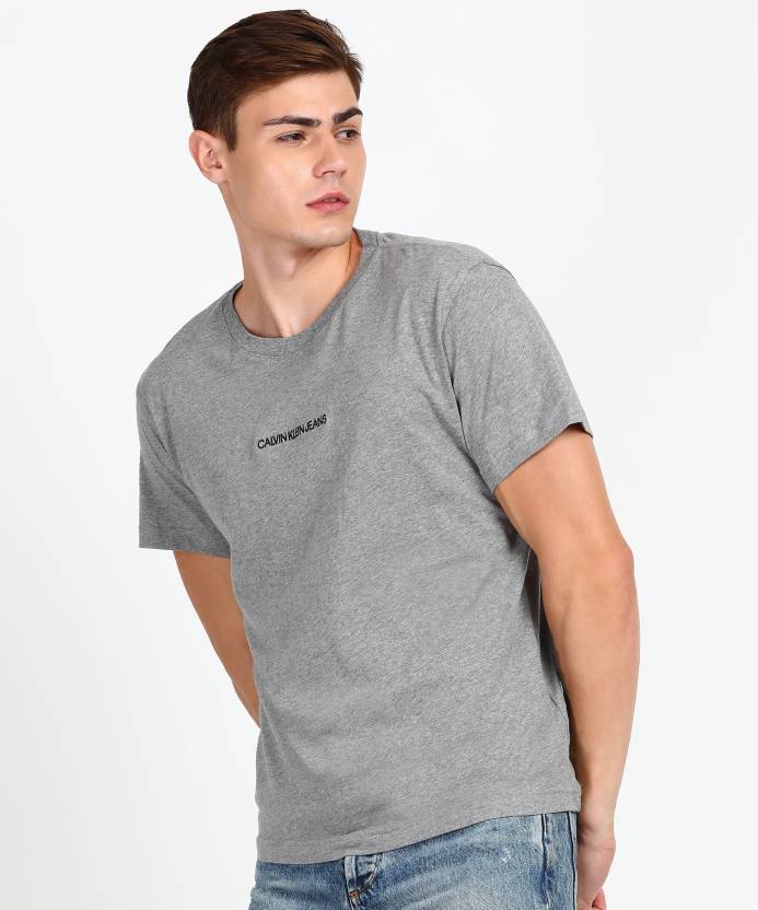 Calvin Klein Jeans Solid Men Round Neck Grey T-Shirt - Buy Calvin Klein  Jeans Solid Men Round Neck Grey T-Shirt Online at Best Prices in India |  