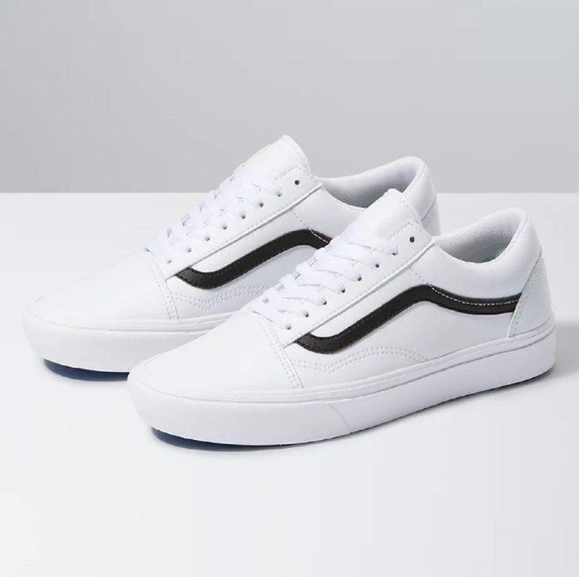 all white slip on vans men