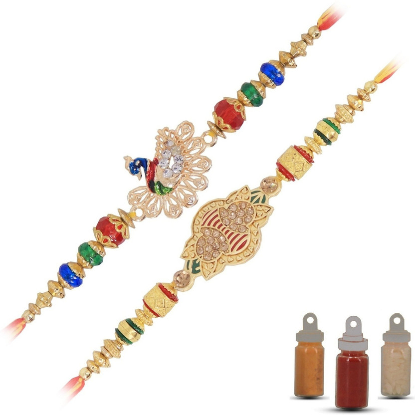 Designer Designer Rakhi Combo For Brother With Roli Chawal And Haldi | Gold Plated Jarkan And Gold Plated Jarkan Work Peacock Design Rakhi Combo | A11A12 Assorted Rakhi by Aseenaa(2 rakhi 1 roli chawal Haldi pack) - Flipkart Deal